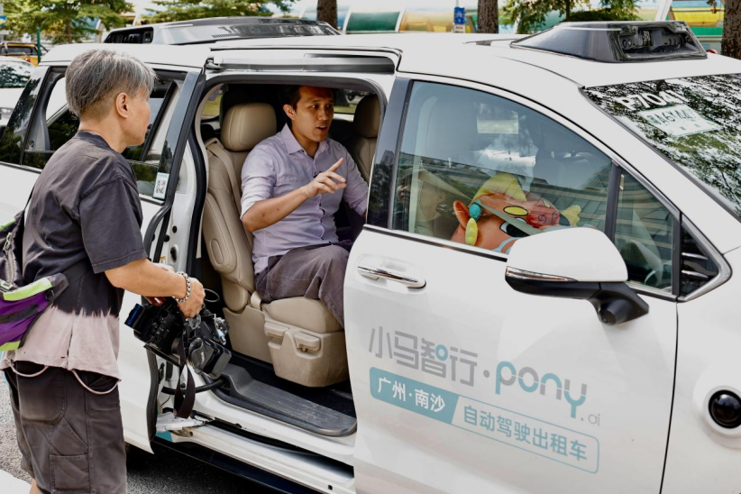 自动驾驶接驳、一键导航找座“黑科技”全方位护航十五运会(图1)
